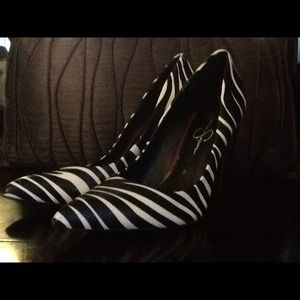 Jessica Simpson heels.  Zebra print with red heel.