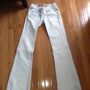 Hollister 0regular flare jeans with a light wash.