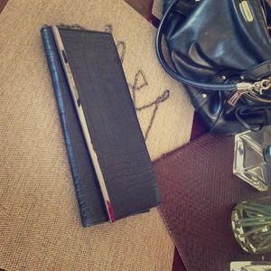 Black clutch with detachable gunmetal strap