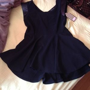 Awesome peplum with faux leather sleeve