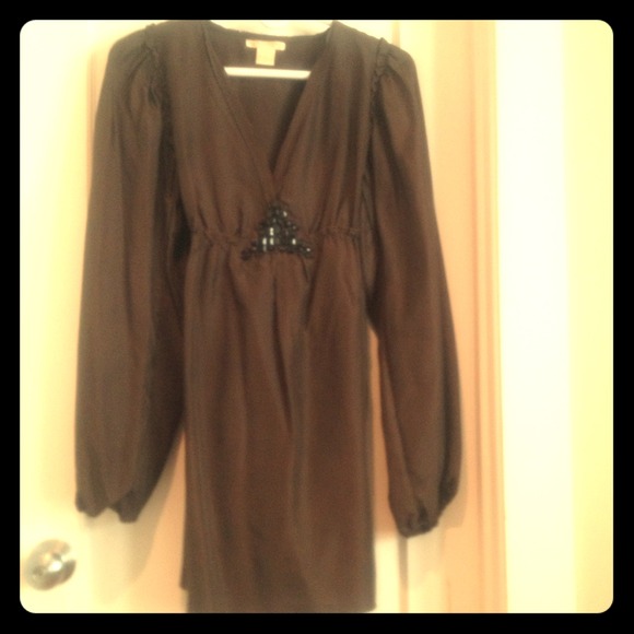 Silk top. Great with leggings. Ties in the back.