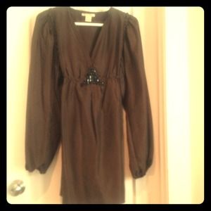 Silk top. Great with leggings. Ties in the back.