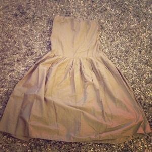 Strapless tan dress.