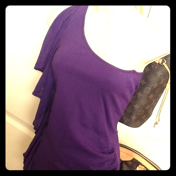 Asymmetrical top. Never worn.