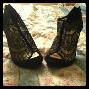 Black lace high heels. Size 10. Never worn.