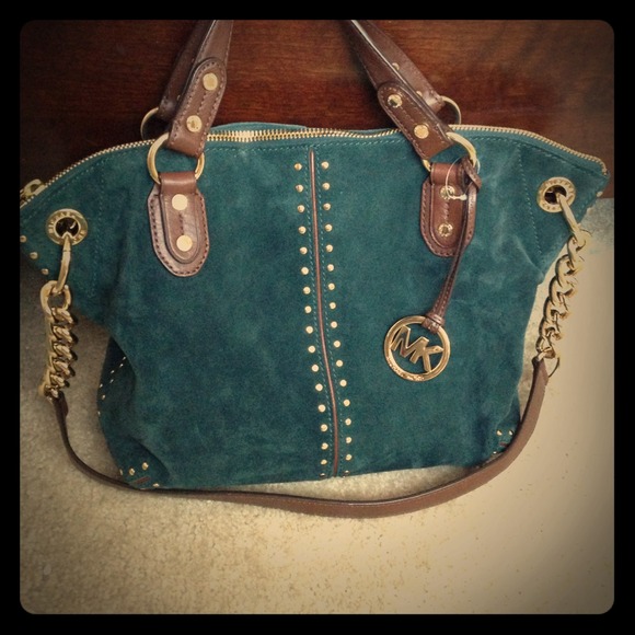Dark Green Leather handlegold chain connected.