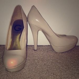 Nude colored pumps