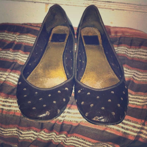 Dolce Vita brown perforated flats.