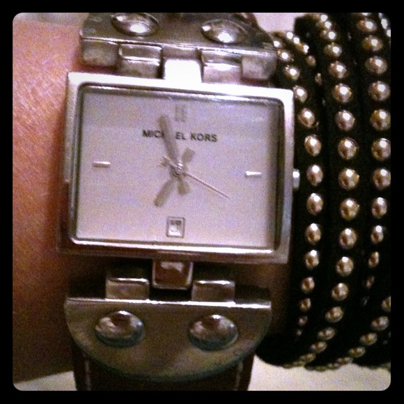 SOLDMichael Kors ladies leather stainless watch