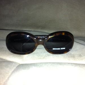 Michael Kors tortoise shell sunglasses.