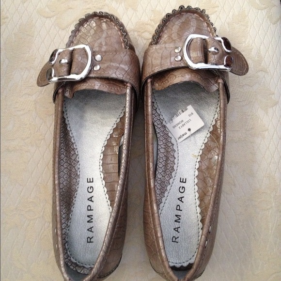Brand new never worn snake skin look flat