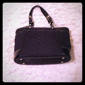 **Reduced - Authentic black signature coach