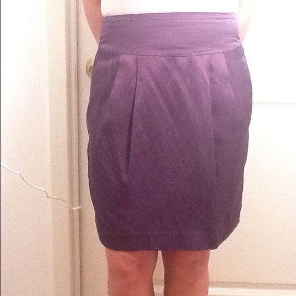 Dark grey skirt.