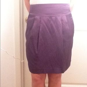 Dark grey skirt.