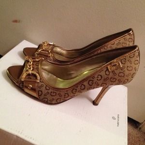 Golden brown Guess shoes