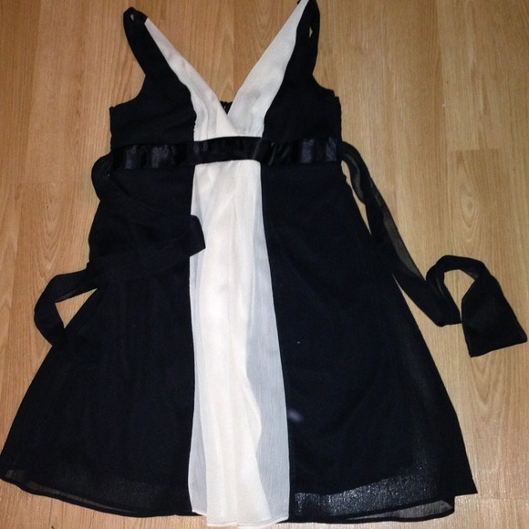 Never worn slenderizing dress!