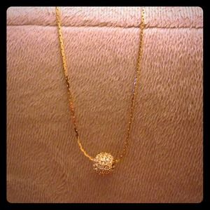 Gold spinner necklace