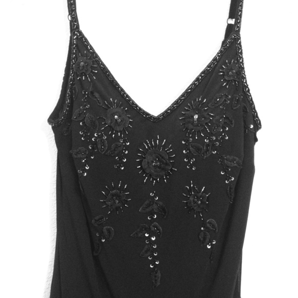 Black embroidered dress.