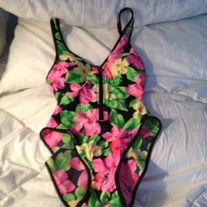 RESERVED.    One piece bathing suit