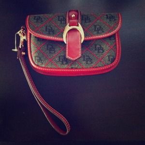 Dooney and Burke Wristlet. Never been used.