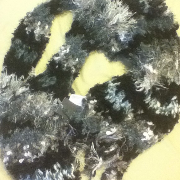 Black, white, and gray ruffled scarf