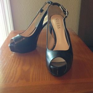 Black leather pumps