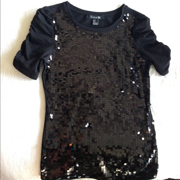 Black sequined top.  Never worn!