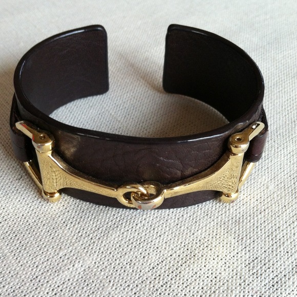 Equestrian style leather cuff bracelet.