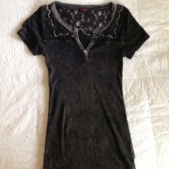 Black t-shirt with lace detail.