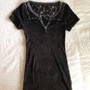 Black t-shirt with lace detail.