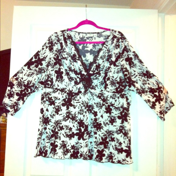 Gorgeous black and white shirt with lace detail!