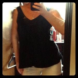 Black flowy tank with sequin detail at neckline