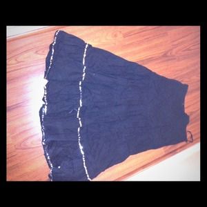 Long black skirt with silver sequin detail