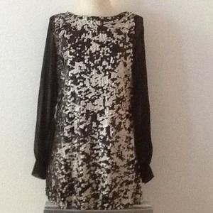 Sequin dress with sheer black sleeves