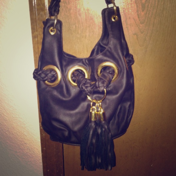Small purse with cheetah inside.