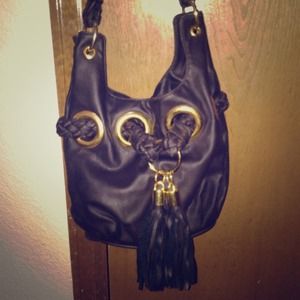 Small purse with cheetah inside.