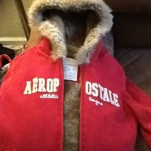 Faux fur lined red zip up