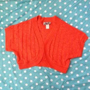 Bright orange shrug