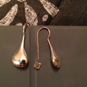SOLD.   Long silver earrings