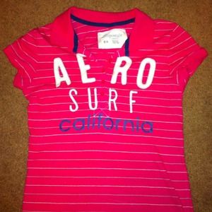 A medium Aeropostale pink stripped Nice polo