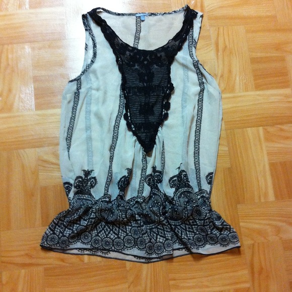 Beige and black tank