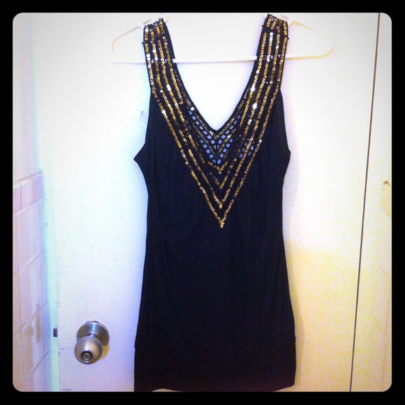 Black v- cut tank top wit gold beading to the top