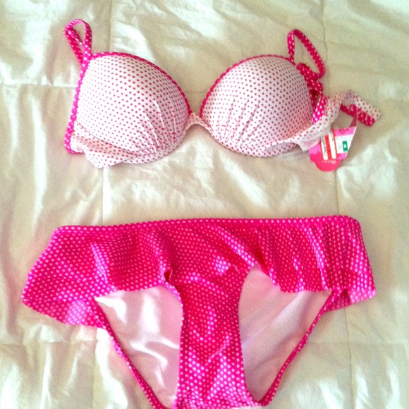 Very cute pink polka dot swim suit! Never worn.