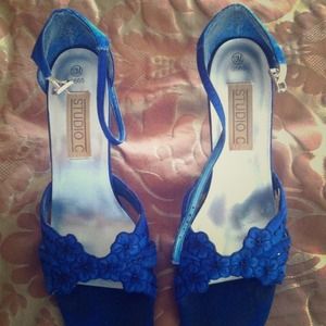 Royal Blue ankle strap sandals.