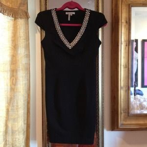 BCBG: black fitted dress with metal details