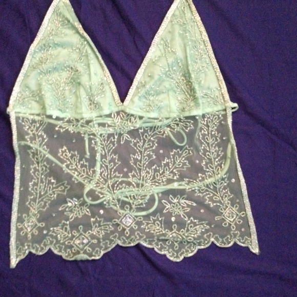 Beautiful sheer sequin backless tank.