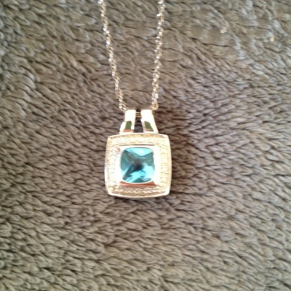 Blue rhinestone necklace on a 16" chain.