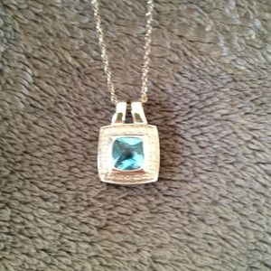 Blue rhinestone necklace on a 16" chain.