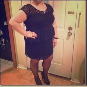 Black peplum dress.