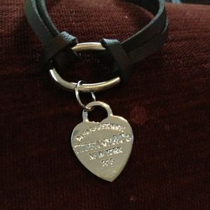 Please return: Tiffany's 925. leather braclet.